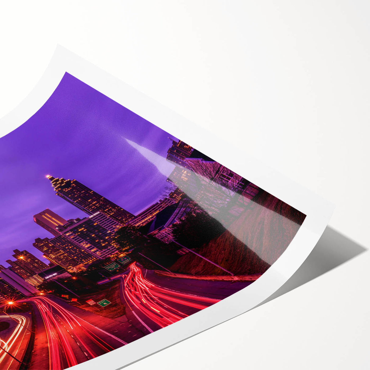 Extra large rolled print featuring a detailed Atlanta skyline with muted gray and blue tones.