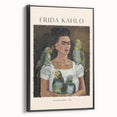 Framed canvas featuring a black and white portrait of Frida Kahlo in a vintage poster style, ideal for bedroom decor.