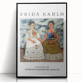 Large abstract wall art featuring a stylized Frida Kahlo portrait in muted colors, framed in black acrylic.