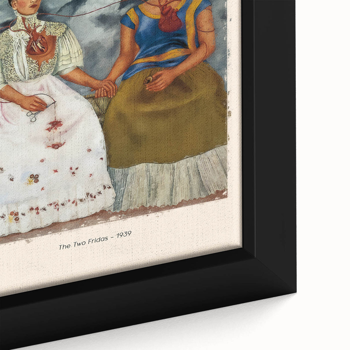 Close-up of a framed canvas featuring a textured, colorful rendition of Frida Kahlo.