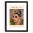 Colorful abstract art print of Frida Kahlo, featuring textured brush strokes in vibrant hues, framed in black.