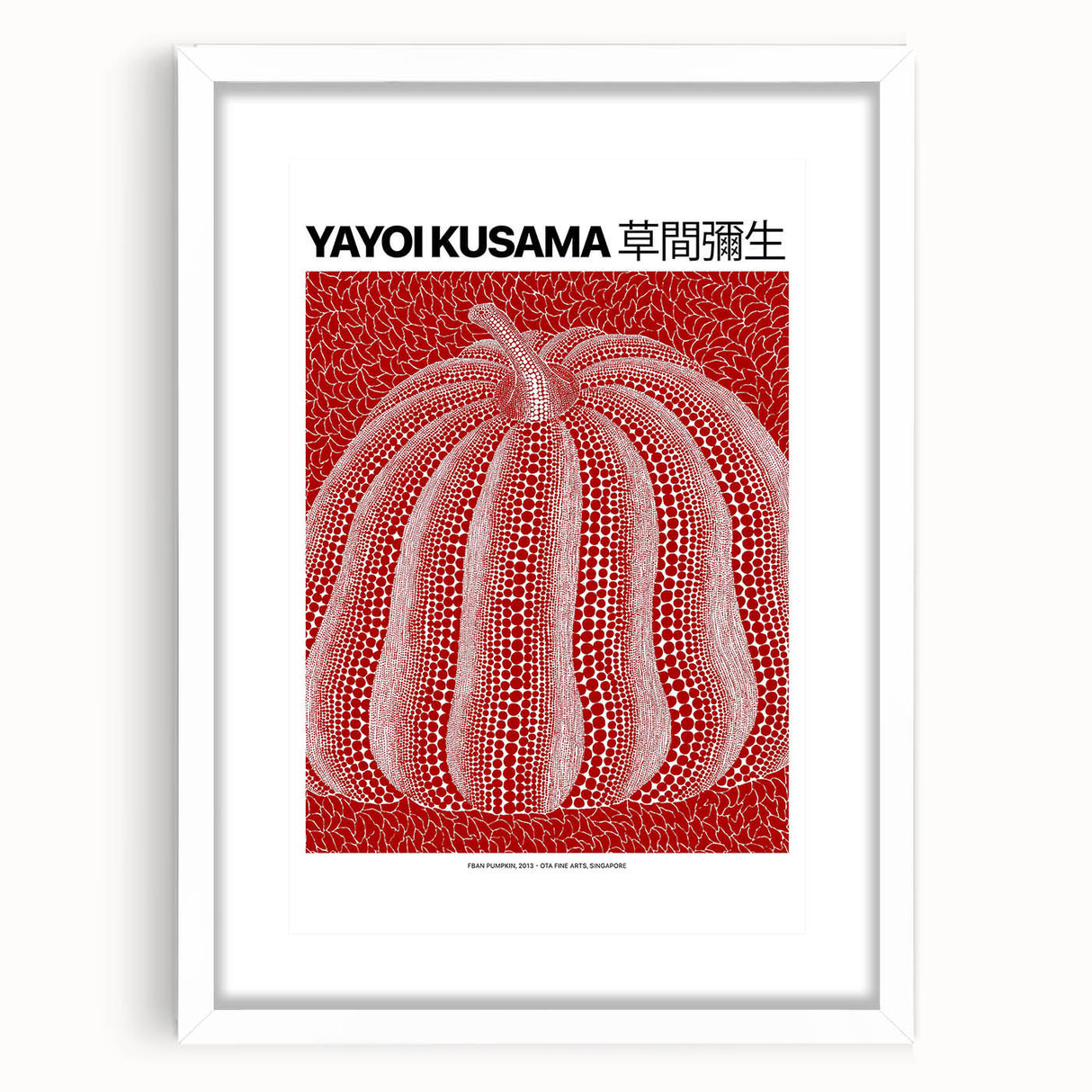 Abstract art print featuring polka dots in red and white, framed in white; suitable for bedroom or dining room decor.