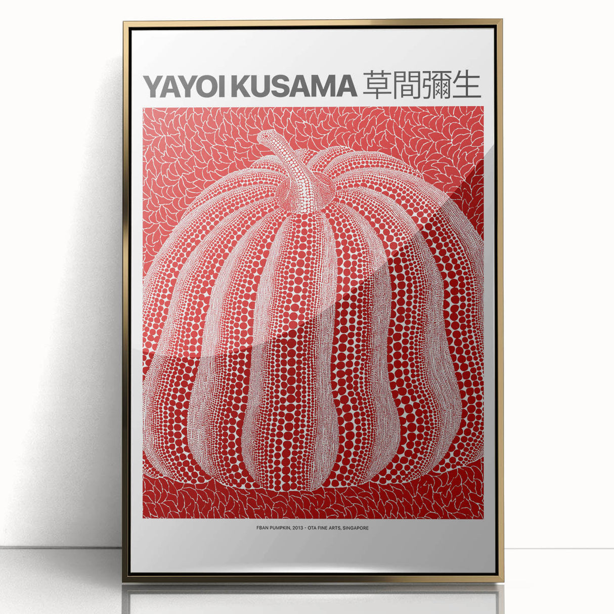 Mid-century modernist art print featuring abstract polka dot patterns in vibrant red and white on a gold-framed acrylic.