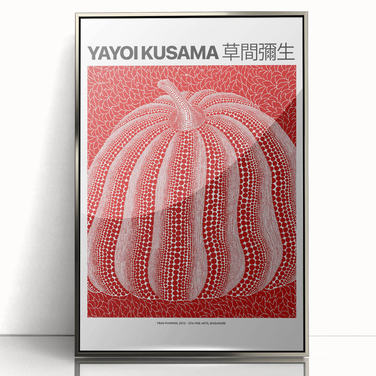 Mid-century modernist art featuring abstract patterns in vibrant colors on a silver-framed acrylic.