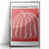 Mid-century modernist art featuring abstract patterns in vibrant colors on a silver-framed acrylic.