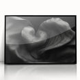 Abstract geometric framed acrylic artwork in black, showcasing intricate designs and sharp angles, ideal for modern decor, displayed in a sleek front view.