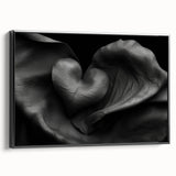 Abstract geometric framed canvas artwork showcasing a sleek black design with vibrant accents, viewed from the side. Ideal for modern home decor or office spaces.