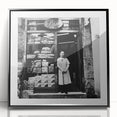 Large abstract wall art featuring silhouettes of people and food items in black and white, framed in acrylic.