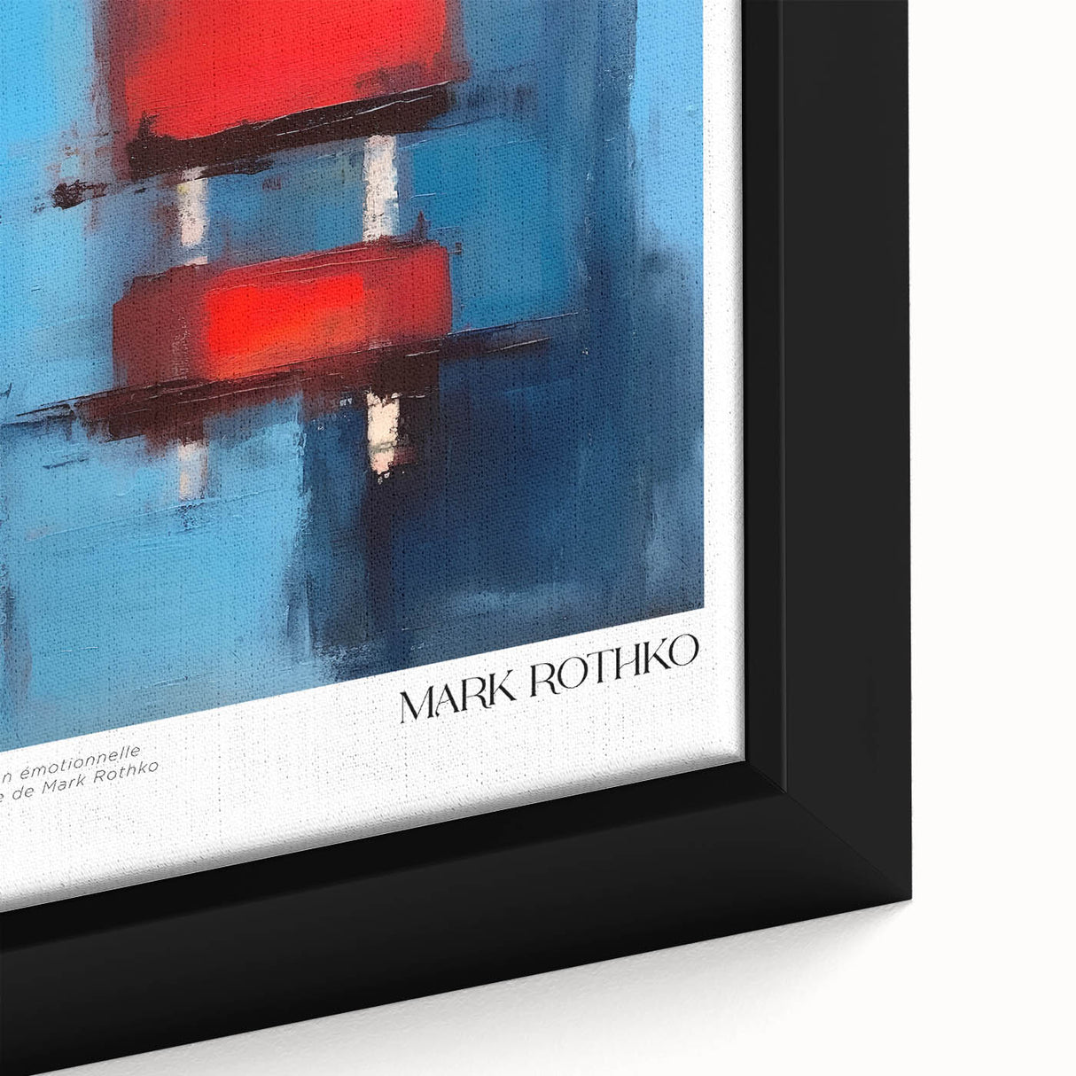 Close-up of a large framed canvas featuring textured black wall art with colorful abstract elements.