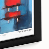 Close-up of a large framed canvas featuring textured black wall art with colorful abstract elements.