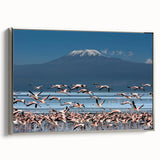 Vintage poster art of a Kenyan landscape on a framed canvas, featuring colorful art with black accents.