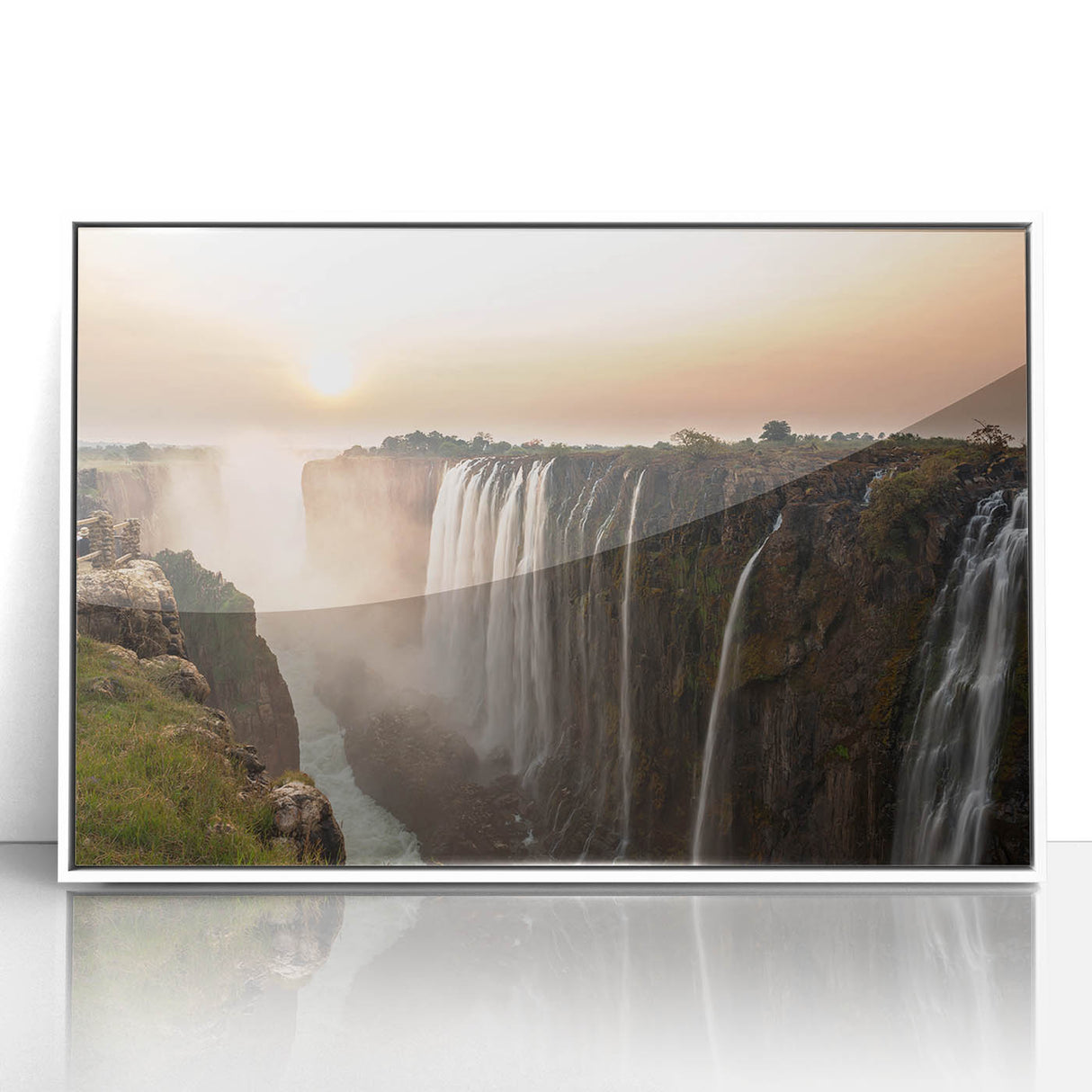 Acrylic print of an African scenery with muted earth tones, framed in white, suitable for nursery wall art.