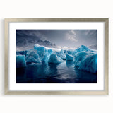 Textured abstract art print of an Antarctic landscape in muted gray and blue tones, framed with a silver mat.