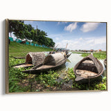 Framed canvas featuring a vintage-style landscape painting of rural Bangladesh in muted gold and black tones.