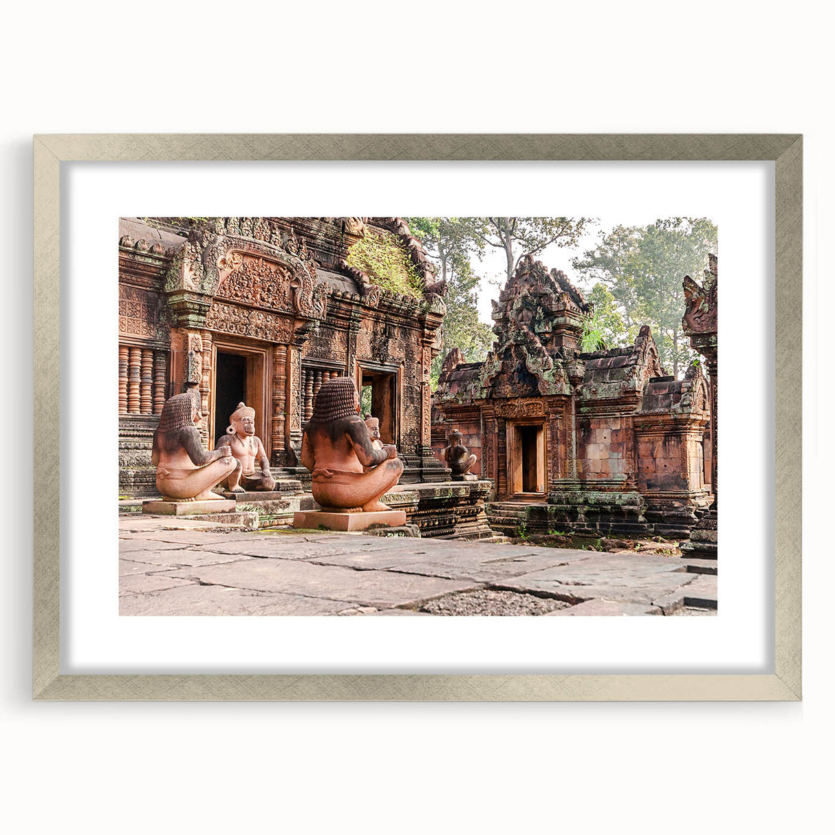 Textured art depicting an abstract Cambodian landscape in muted earth tones, framed in silver, ideal for bedroom ambiance.
