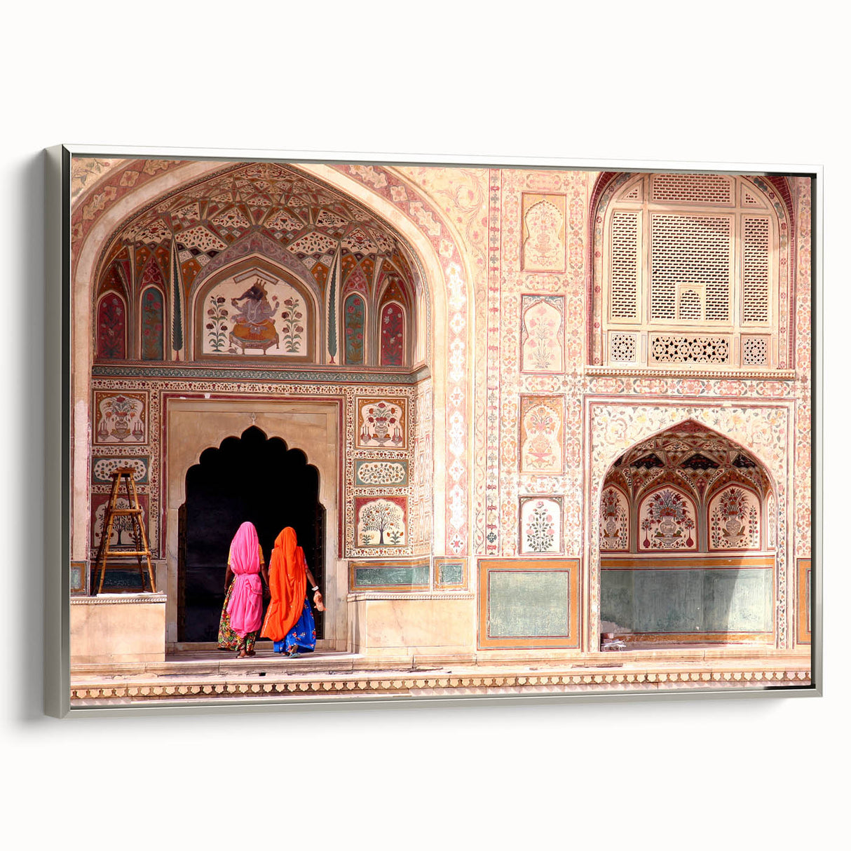 Framed canvas featuring a vintage-style landscape art painting of an Indian scenery in colorful and black tones.