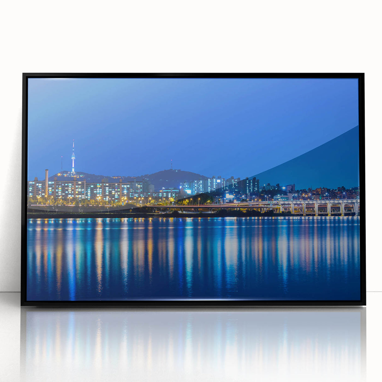 Large abstract wall art depicting Seoul's skyline in black and white tones on a framed acrylic.
