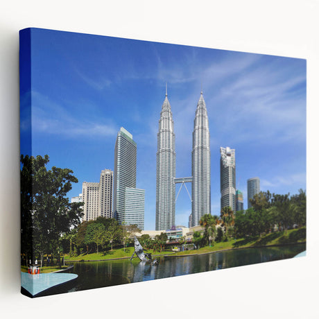 Side view of a stretched canvas depicting a serene Malaysian landscape in muted green and blue tones.