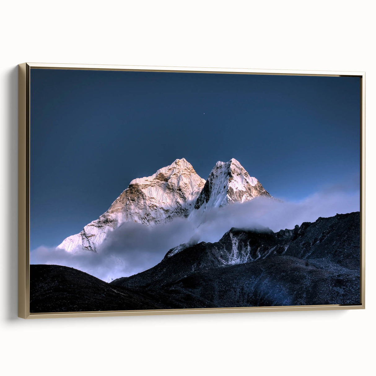Framed canvas of vintage-style landscape painting depicting the Everest scenery in muted gold and black tones.