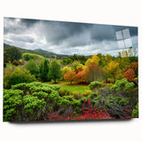 Large abstract wall art of Adelaide skyline in muted blue and green hues on acrylic glass.