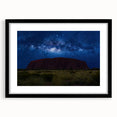 Extra large abstract art print of Ayers Rock in vibrant, textured colors on a framed black canvas.