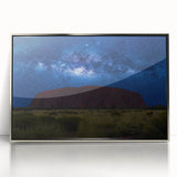 Framed acrylic print of Ayers Rock in Australia, depicted in art deco style with muted earth tones.
