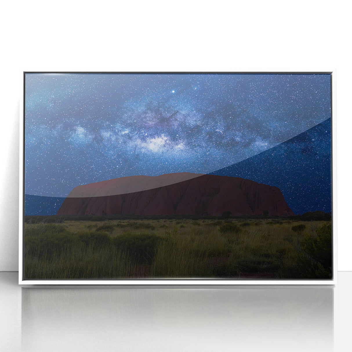Large art print of Ayers Rock in muted earth tones, framed in white acrylic, suitable for modern art wall decor.
