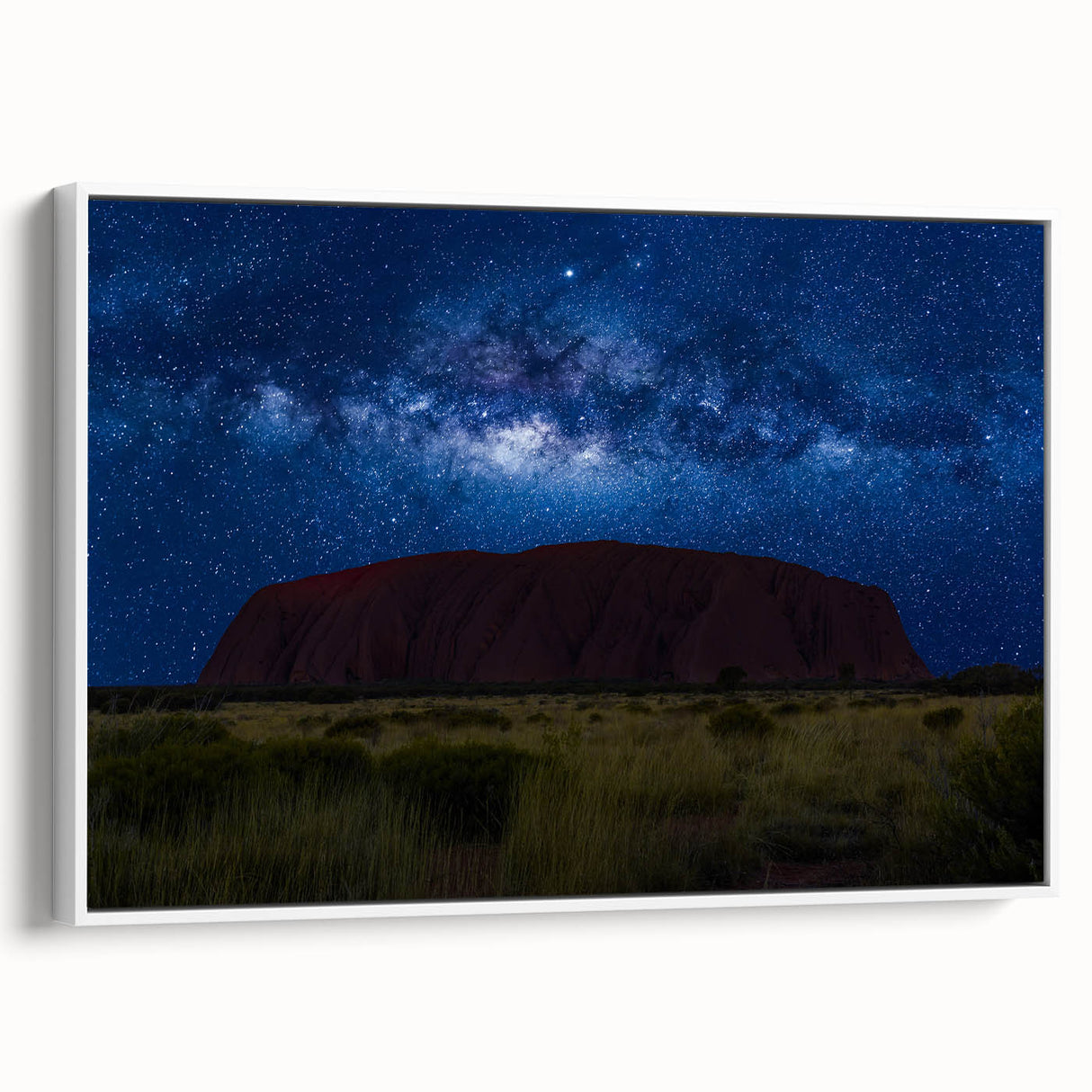 Framed canvas wall art depicting Ayers Rock in vintage style with muted earth tones, ideal for bedroom decor.