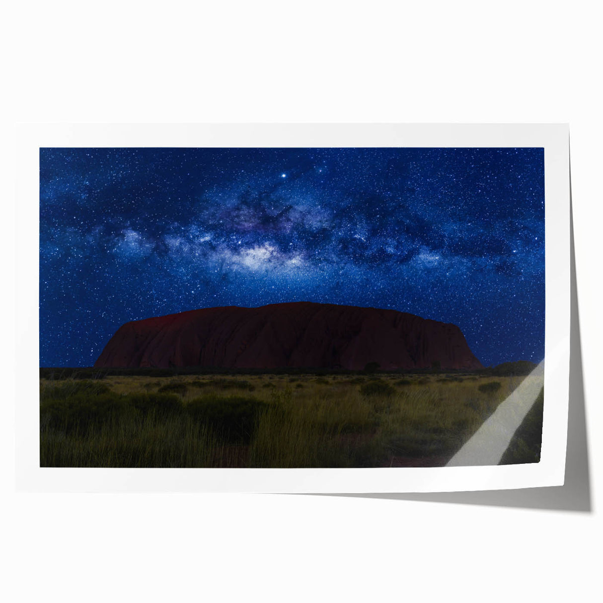 Rolled print of Ayers Rock in Australia with earthy red and orange tones, ideal for art wall dining room.