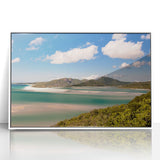 Large art print of the Great Barrier Reef on white framed acrylic, featuring vibrant blue and green tones.