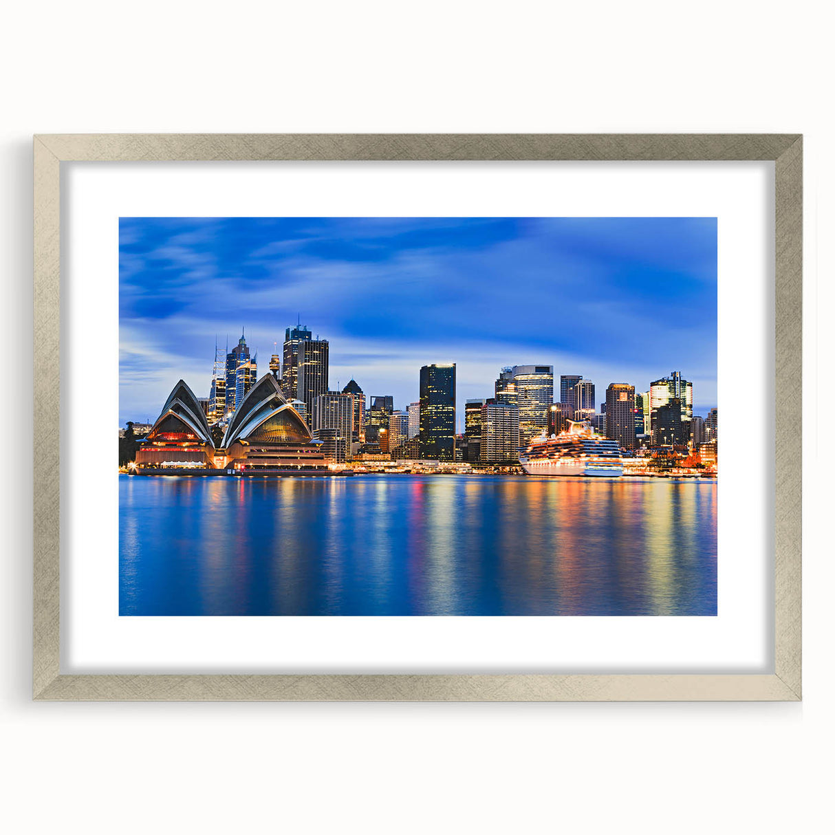 Extra large abstract art print of Sydney scenery in muted blue tones, framed in silver, ideal for living room decor.
