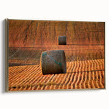 Framed canvas of a Saskatchewan landscape in muted gold and black tones, ideal for bedroom wall art.