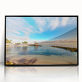 Large abstract wall art depicting a Caribbean seascape in muted blue and green tones, framed in black acrylic.
