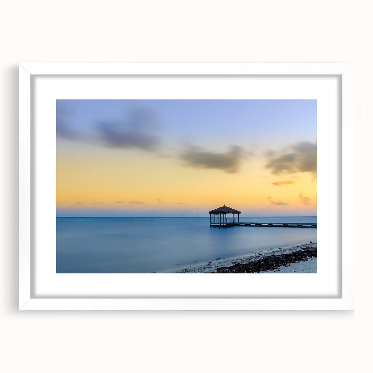 Extra large abstract art print of Caribbean scenery in vibrant blues and greens, framed with a white mat.