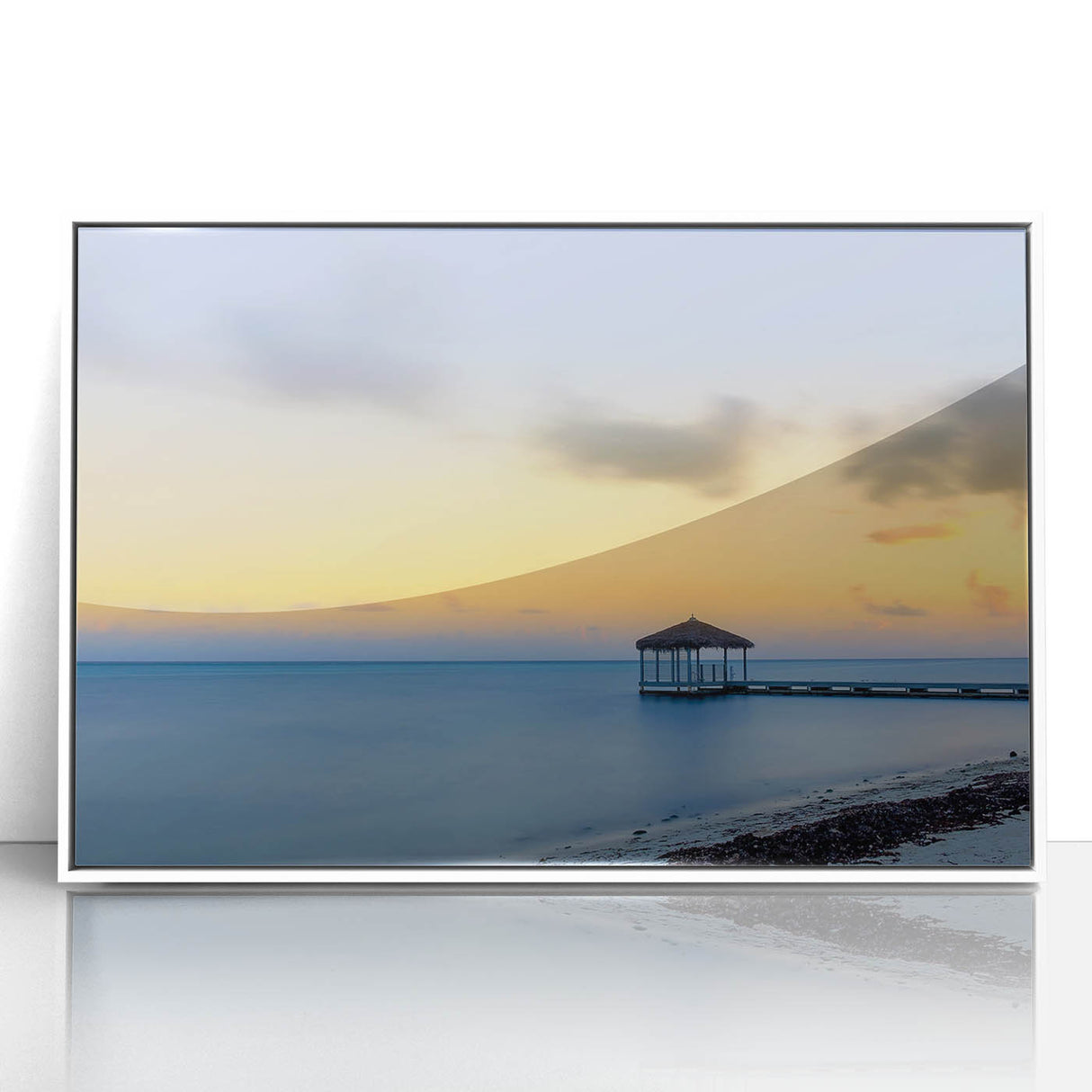 Acrylic print of a Caribbean landscape in muted blues and greens, framed in white, suitable for modern art wall decor.