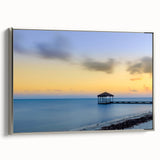 Framed canvas wall art depicting a serene Caribbean landscape in muted blues and greens, ideal for bedroom decor.
