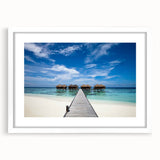 Abstract textured art print of Caribbean scenery in white frame, featuring vibrant blue and green tones.