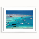 Textured abstract art print of Caribbean scenery in muted blue and green tones on a framed white mat, ideal for bedroom art.