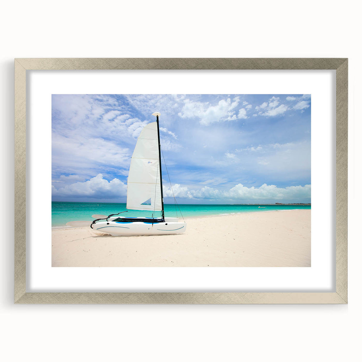 Abstract textured art print of Caribbean scenery in silver frame, using blue and green tones, ideal for bedroom art.
