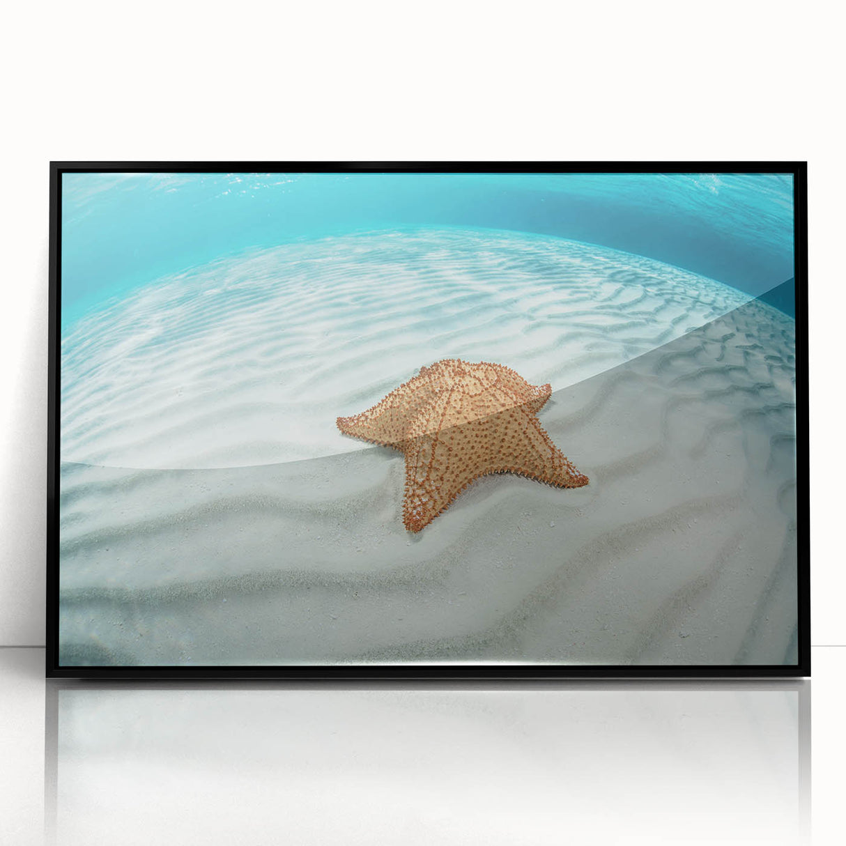 Large abstract wall art depicting the Caribbean Virgin Islands in vibrant blues and greens, framed in black acrylic.