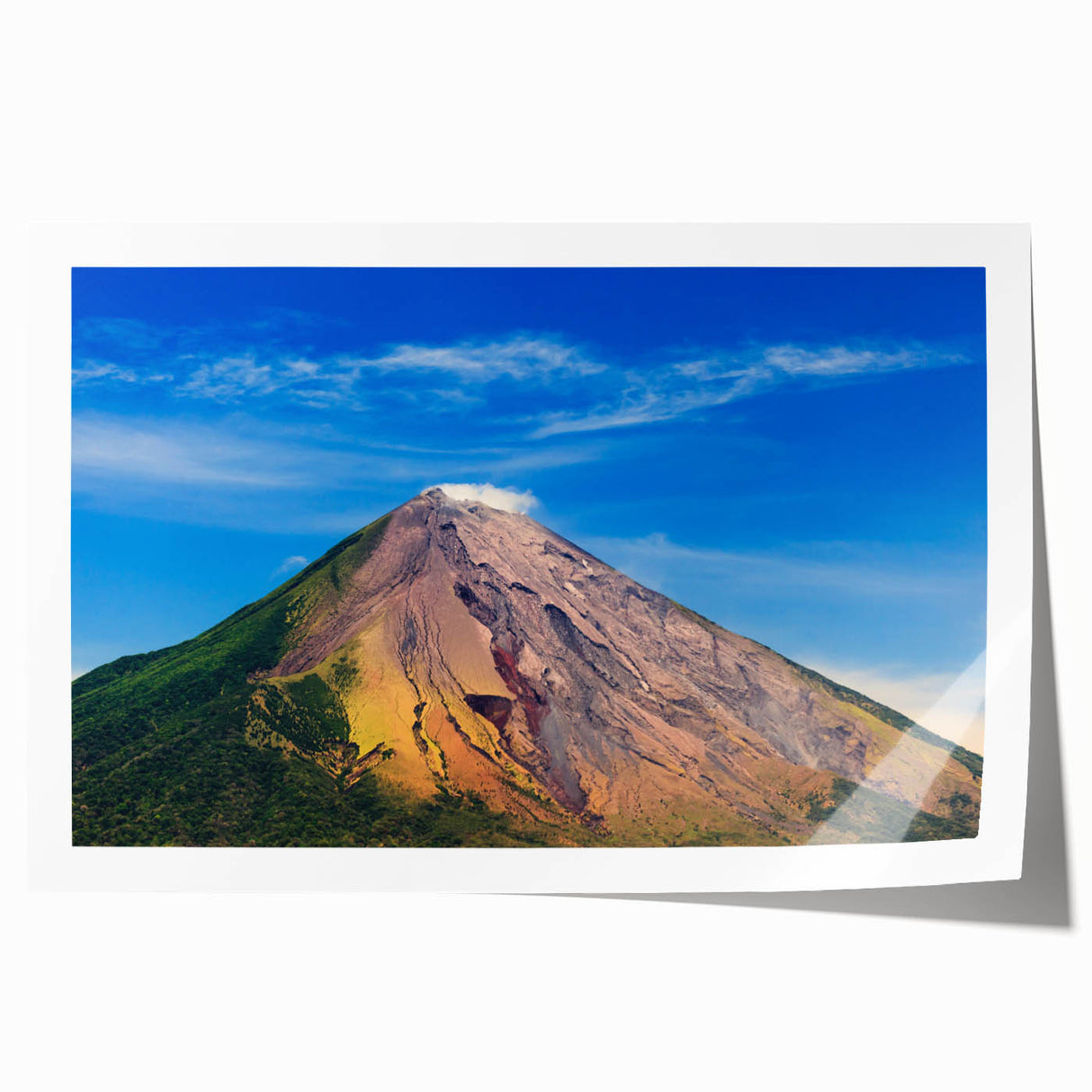 Rolled print of a Central American landscape featuring lush greenery and a distant mountain, in muted earth tones.