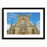 Extra large abstract art print of a colorful European scenery, framed in black, ideal for living room decor.