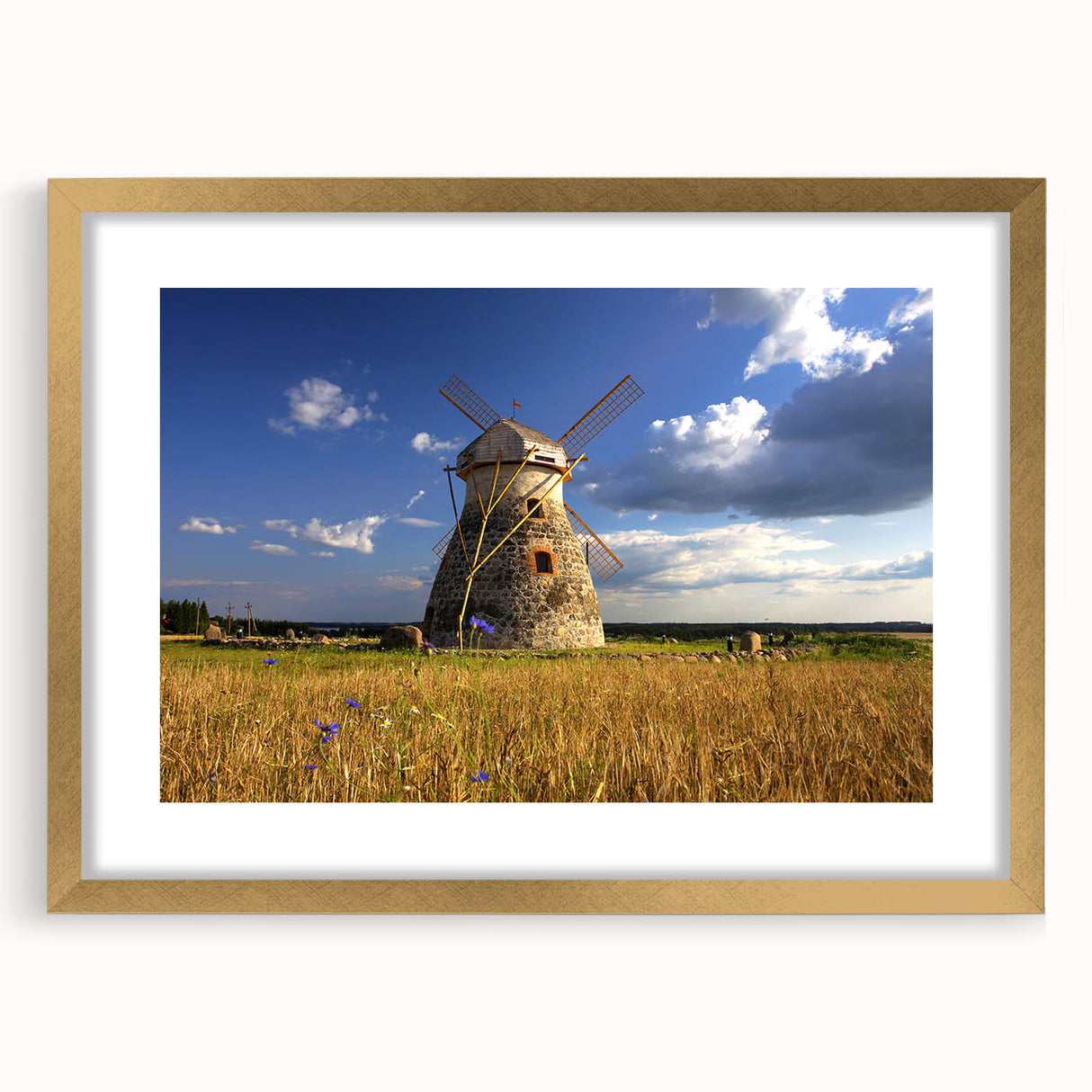 Abstract art print of a European landscape in muted earth tones on a gold-framed canvas, suitable for dining room decor.