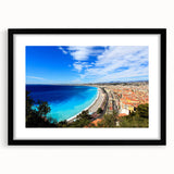 Colorful abstract art print of a scenic European landscape in Nice, framed in black, ideal for living room decor.
