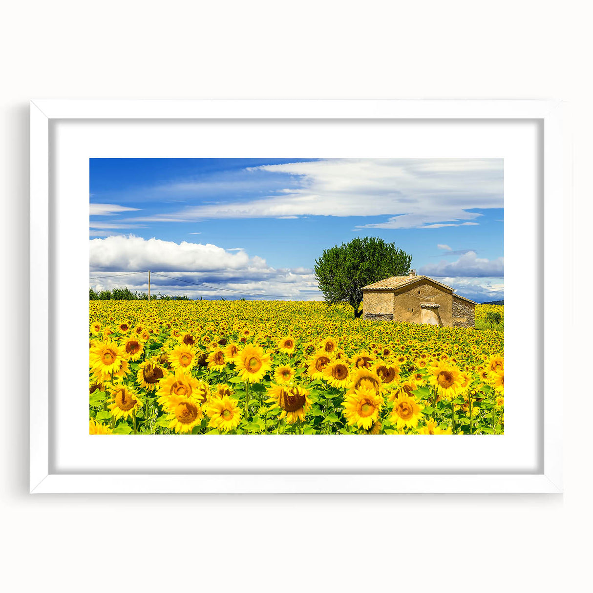 Textured art print of a southern France landscape in muted earth tones on a framed white mat, ideal for bedroom wall decor.