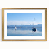 Abstract art print of a Bavarian landscape in muted green and blue tones, framed in gold, suitable for dining room decor.