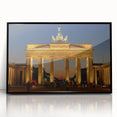 Large abstract wall art depicting a stylized Berlin cityscape in muted gray tones, framed in black acrylic.