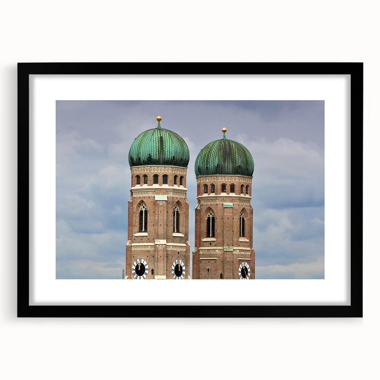 Abstract art print of Munich scenery in vibrant colors on a large textured canvas, framed in black.