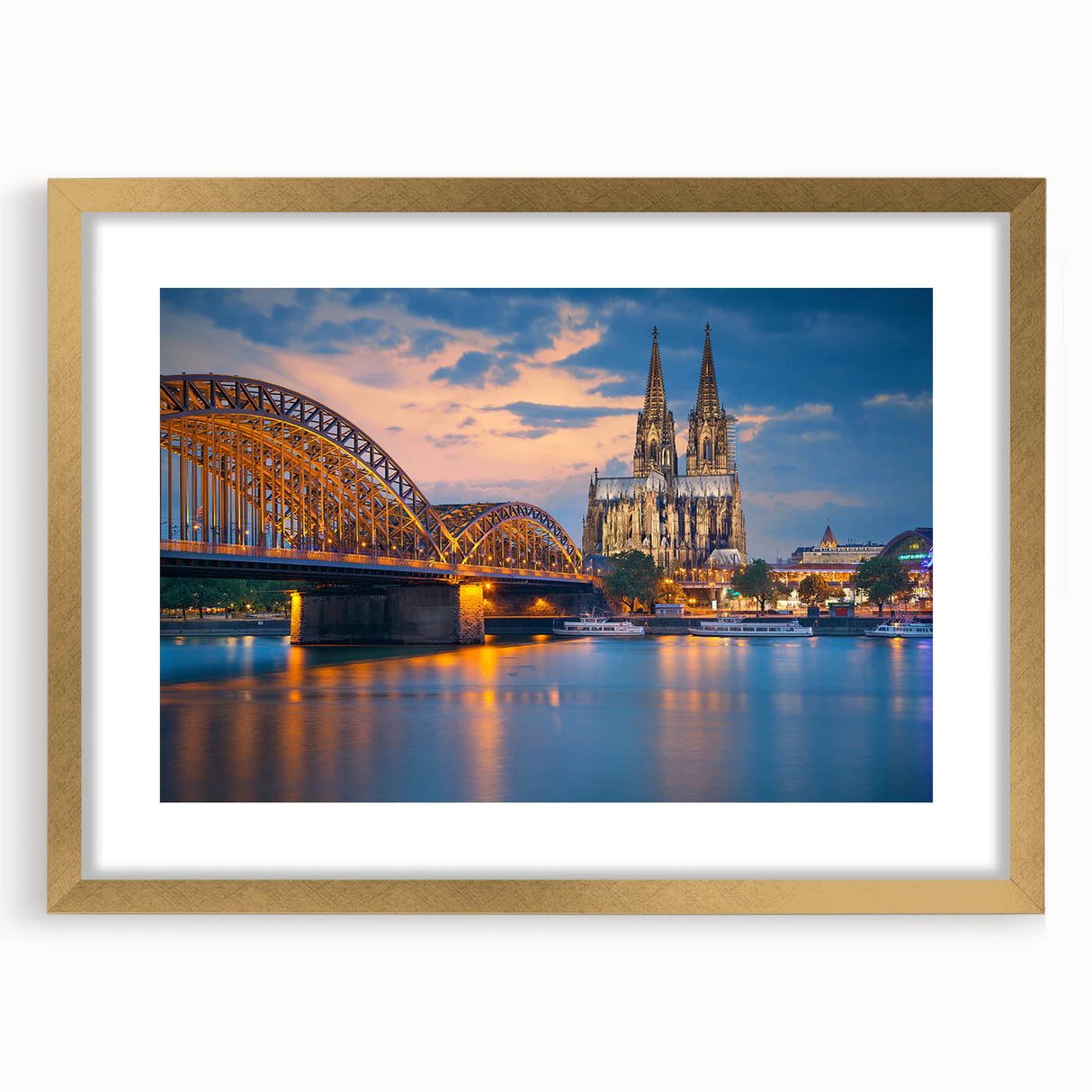 Abstract art print of a European scenery in muted gold and green tones on a framed canvas, ideal for dining room decor.