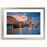 Extra large framed wall art depicting abstract scenery in Germany, using a textured palette of cool blues and greens.